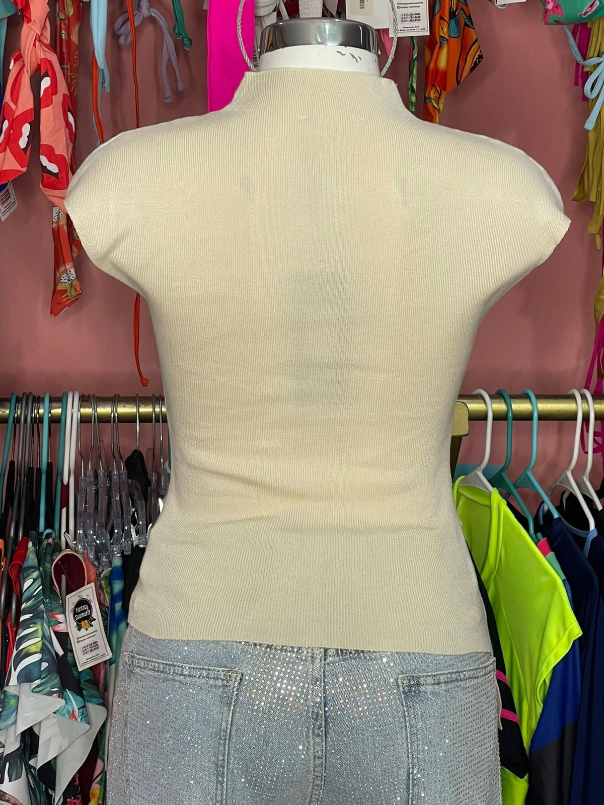 Blusa asimétrica hueso
