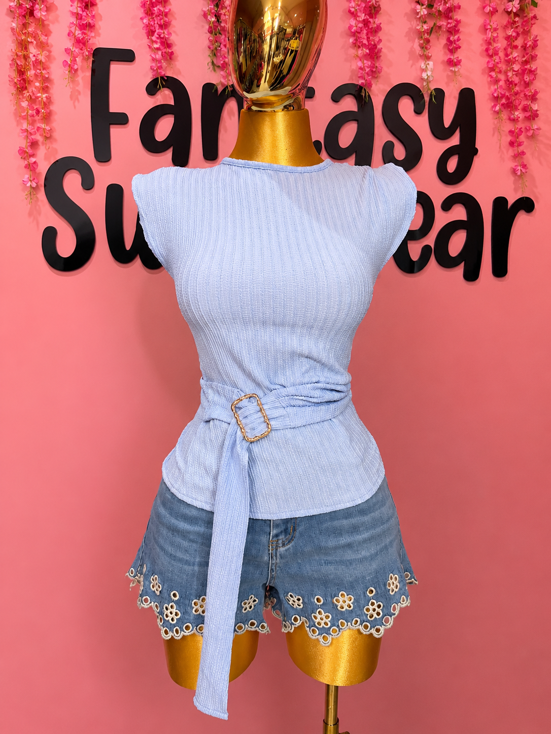 Blusa celeste con herraje