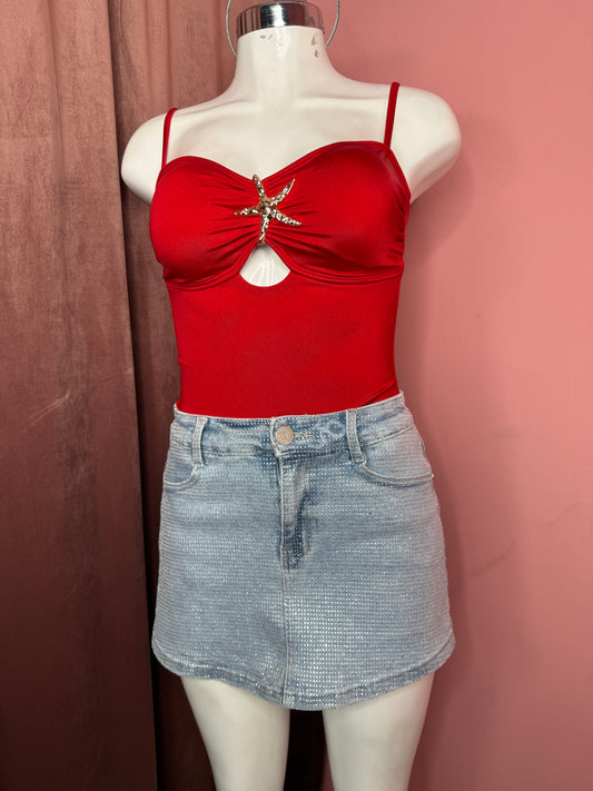 Falda short brillos